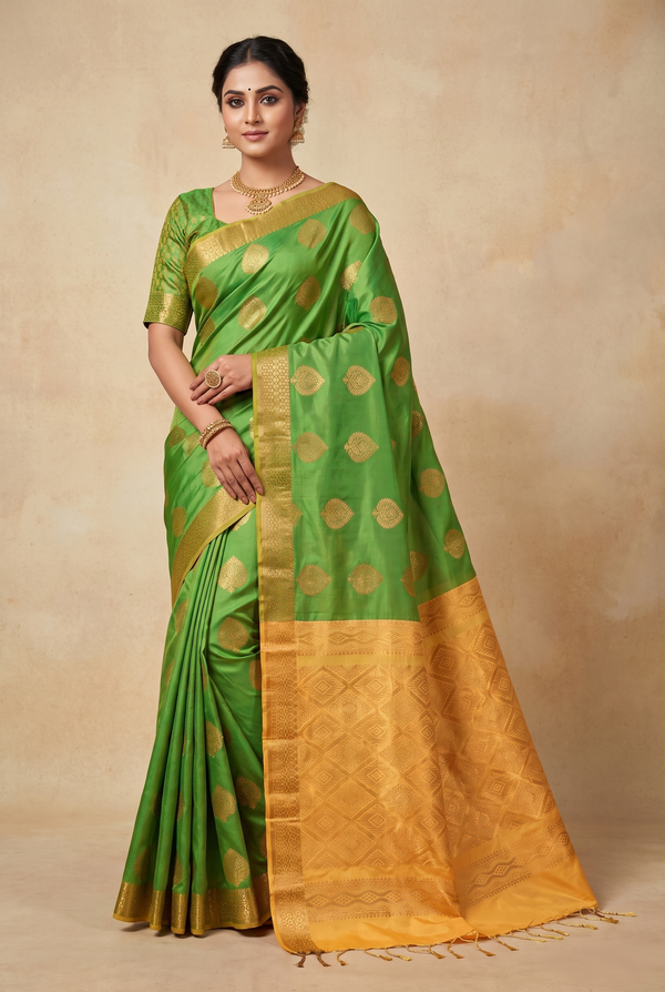 Green Semi Soft Silk Saree with Delicate Gold Zari Buttas and Floral Zari Border, Traditional Look