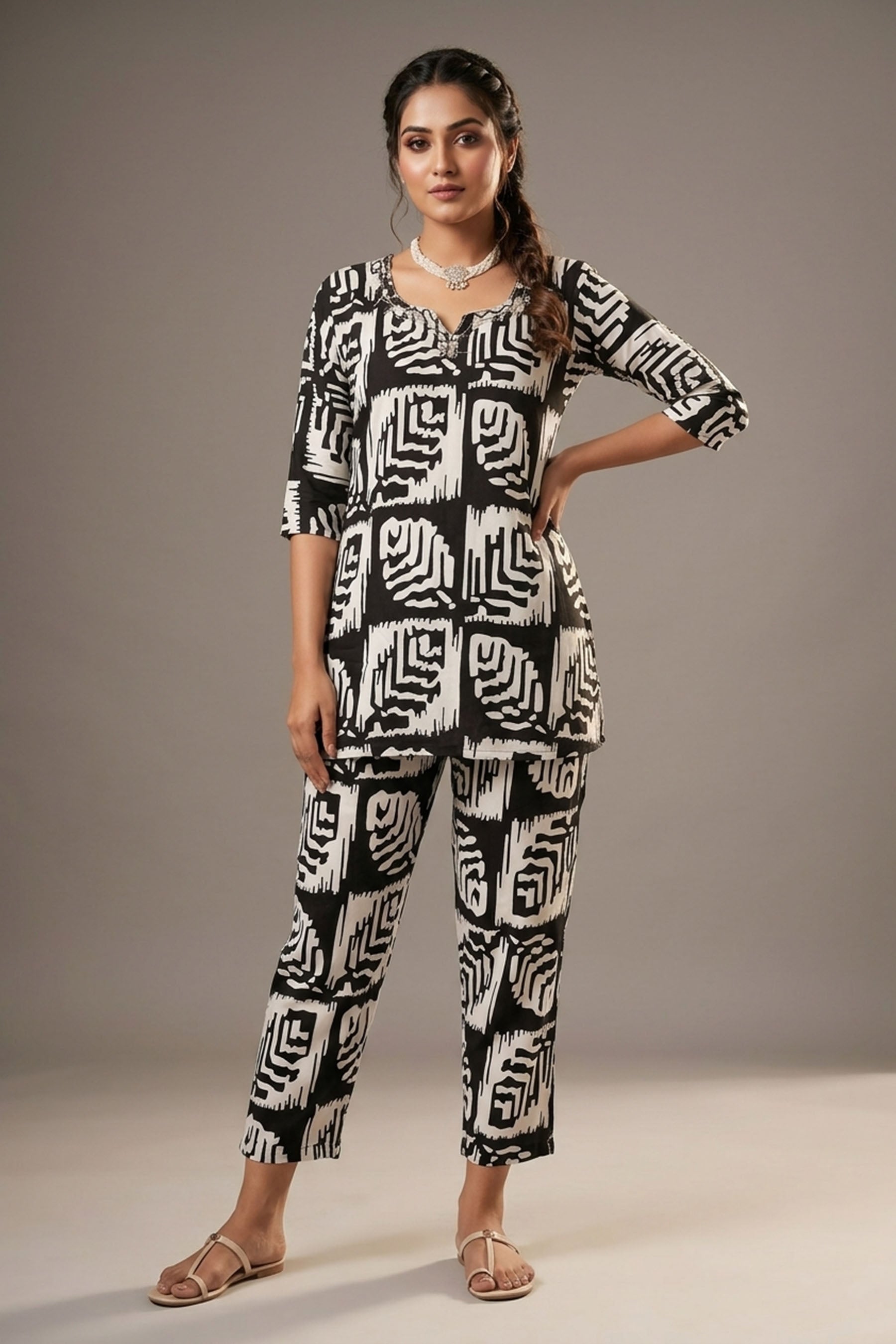 Black & White Rayon Printed Kurti Set with Beaded Neck and Elastic Pant — front pose