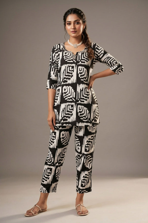 Black & White Rayon Printed Kurti Set with Beaded Neck and Elastic Pant — front pose