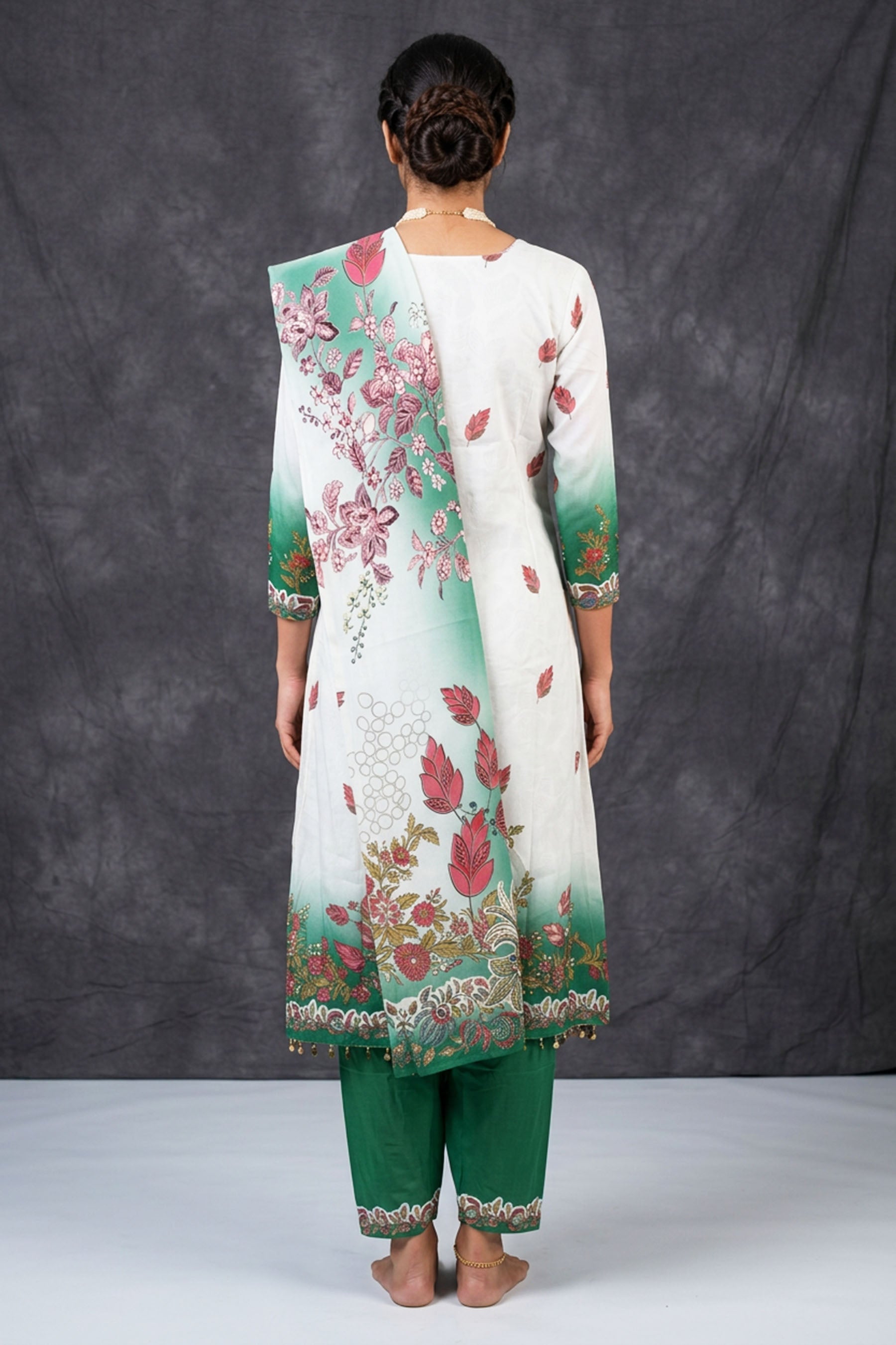 Cream and Green Crepe 3-Piece Salwar Suit with Embellished Kurti, Cotton Dupatta and Elastic Pants — back pose