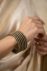 Stone-Studded Metallic Bangle Set with Sparkling Rows for Festive Wear - Neon Orange, Black, Rani Pink - Black