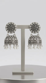 Oxidized Silver-Tone Jhumka Earrings with Studded Stones and Pearl Drops - Black