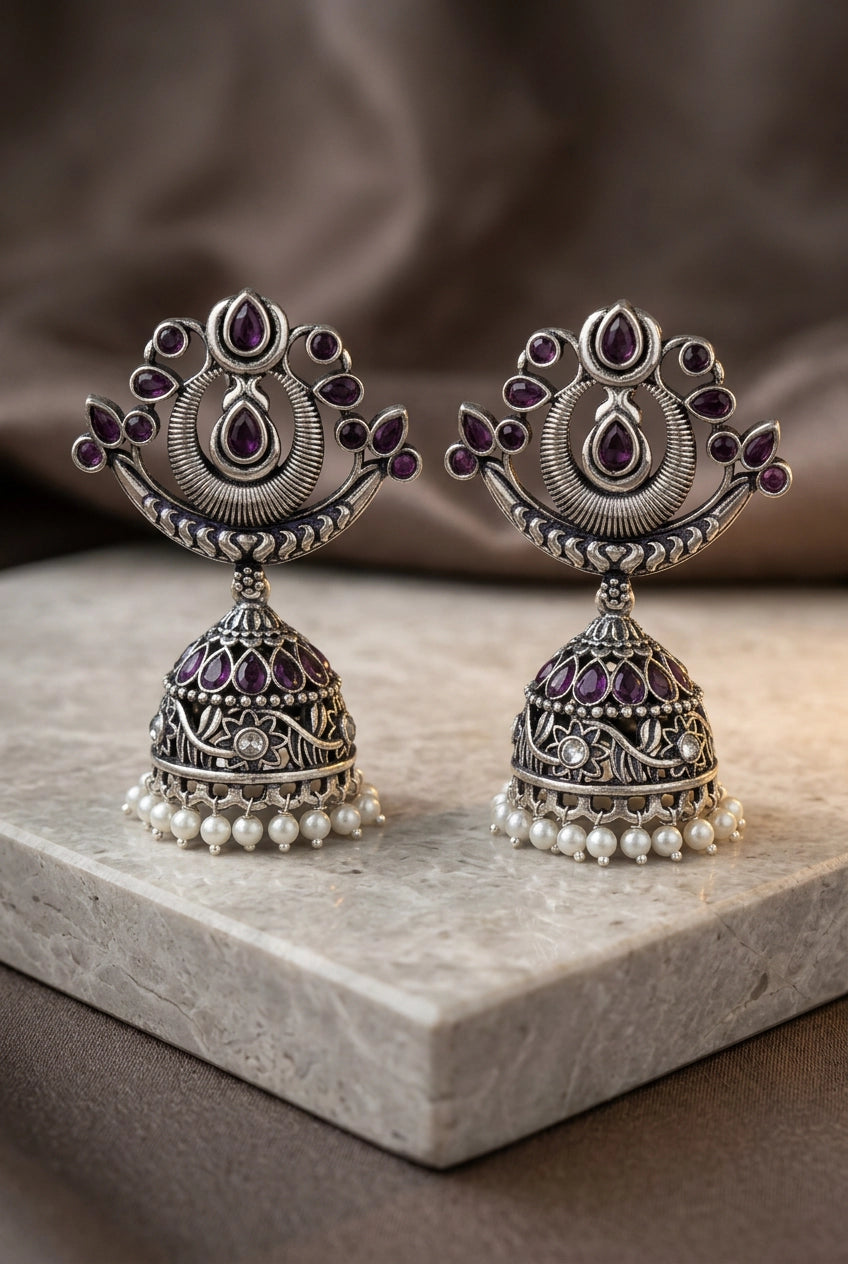Oxidized Silver Traditional Jhumka Earrings with Crescent Top, Teardrop Stones & Pearl Tassels - Purple