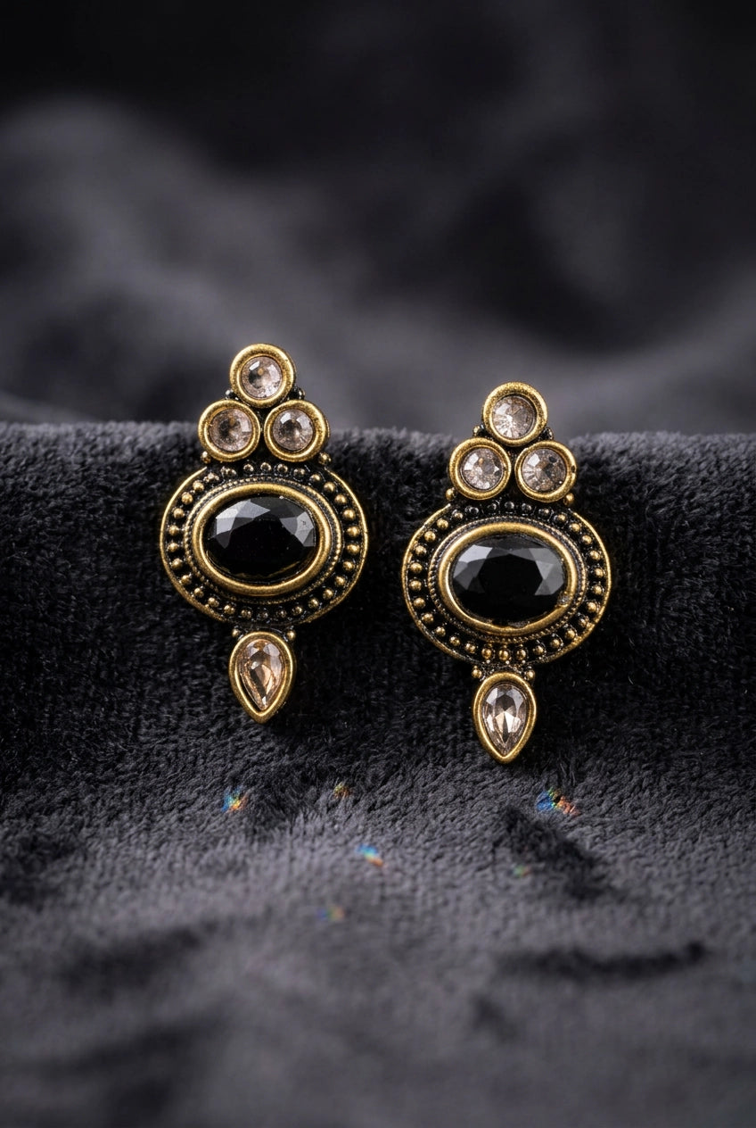 Antique-Style Black Stud Earrings with Oval Stone and Gold-Tone Bead Detailing for Traditional Wear - Black