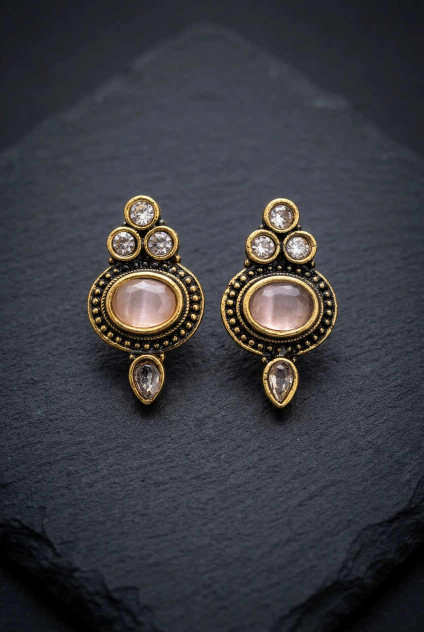 Light Pink Oval Stud Earrings with Antique Gold-Tone Detail and Tiny Bead Accents for Traditional Wear - Light Pink
