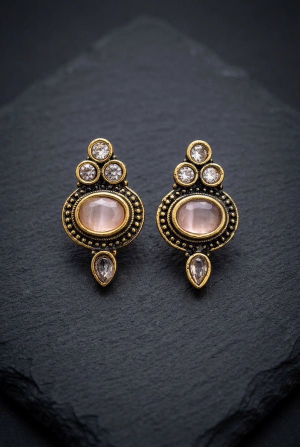Light Pink Oval Stud Earrings with Antique Gold-Tone Detail and Tiny Bead Accents for Traditional Wear - Light Pink