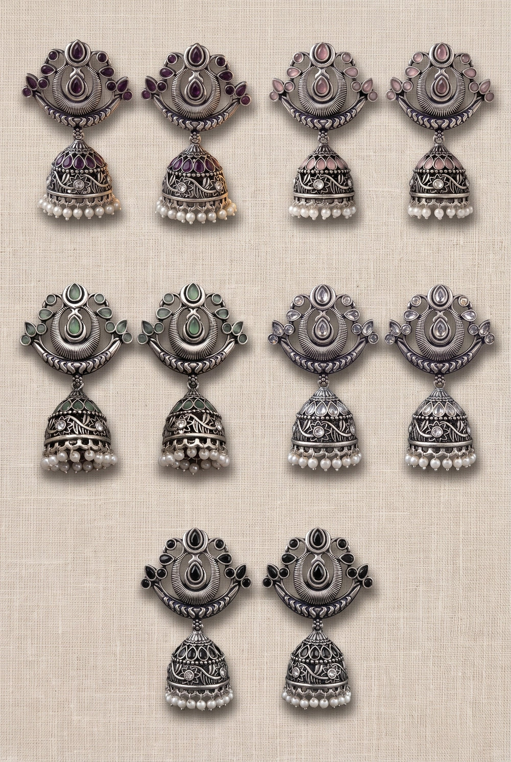 Oxidized Silver Traditional Jhumka Earrings with Crescent Top, Teardrop Stones & Pearl Tassels