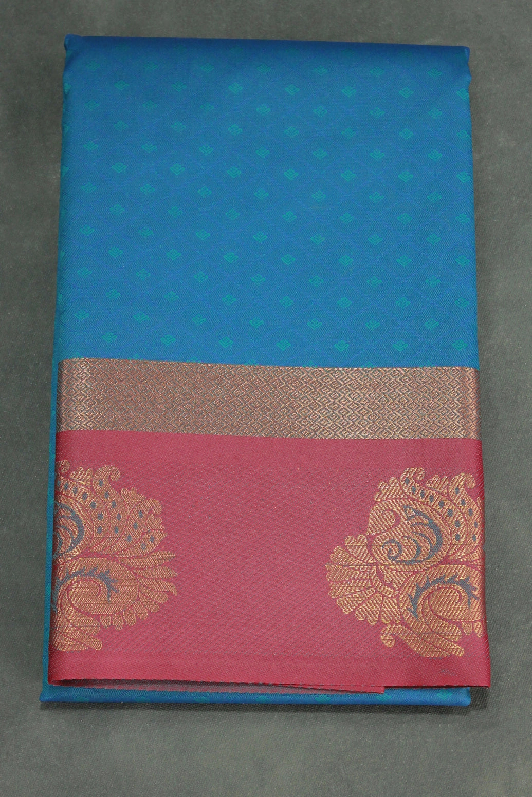 Peacock Blue Emboss Satin Border Semi Silk Saree with Floral Design and Blouse Piece - Peacock Blue