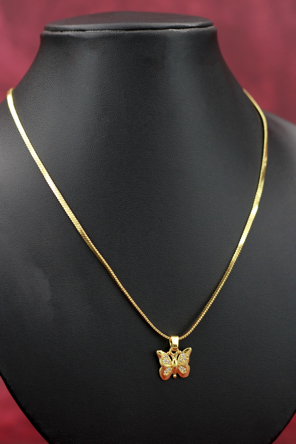 Gold-tone Textured Chain Necklace with Butterfly Pendant, Jeweled Finish for Traditional and Festive Wear - Gold