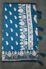 beautifully adorned with intricate zari weaving banarasi saree. The saree features delicate floral and mango motifs woven across the body, c - Peacock Blue