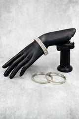 Silver-tone crystal bangles with sleek sparkle, perfect for festive wear, parties, and elegant ethnic styling.