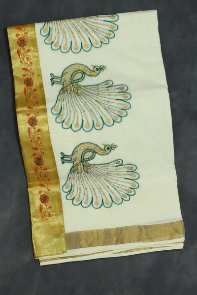 Fabric: Pure Kerala Cotton – lightweight, breathable, 
        •        Design: Rich machine embroidery in Gold zari and thread with detaile - White