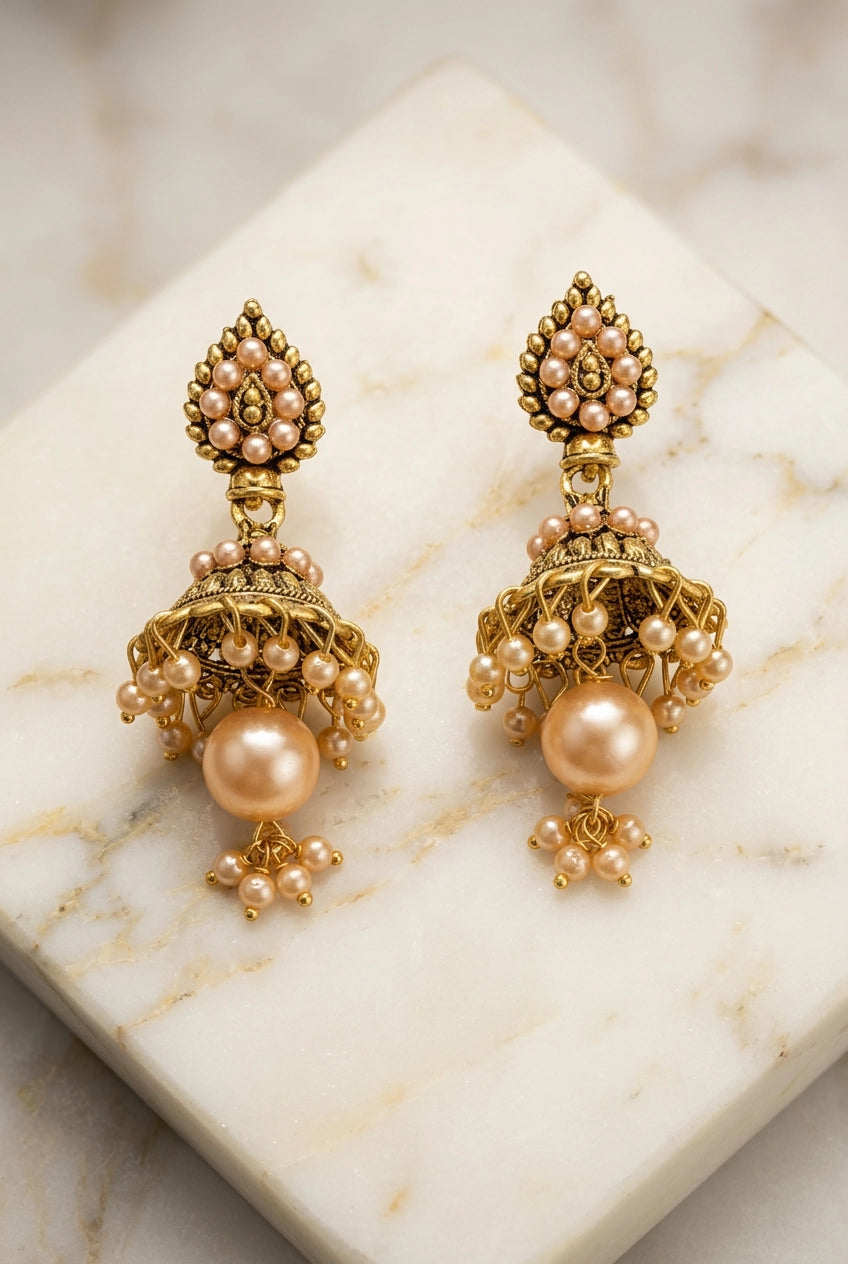Peach Pearl Jhumka Earrings in Antique Gold Tone, Floral Stud with Hanging Beads for Traditional Wear - Peach