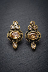 Antique Finish Gold-Tone Stud Earrings with Oval Center Stone and Beaded Detail for Ethnic Wear - Gold