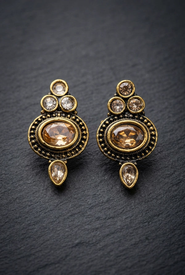 Antique Finish Gold-Tone Stud Earrings with Oval Center Stone and Beaded Detail for Ethnic Wear - Gold