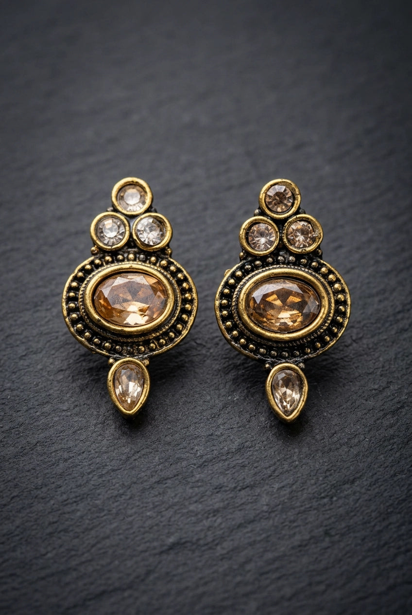 Antique Finish Gold-Tone Stud Earrings with Oval Center Stone and Beaded Detail for Ethnic Wear - Gold
