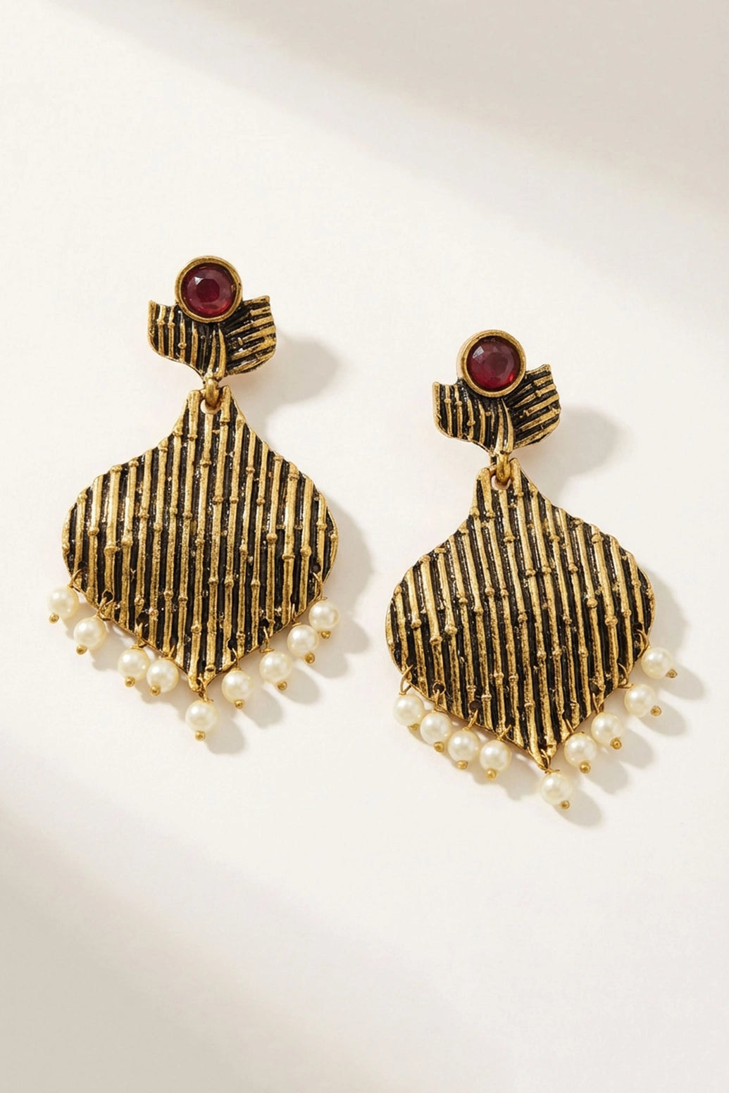 Maroon Stone Gold-Tone Jhumka Earrings with Pearl Beads for Traditional Festive Wear - Maroon