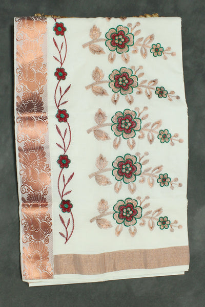 Fabric: Pure Kerala Cotton – lightweight, breathable, 
        •        Design: Rich machine embroidery in Copper zari and thread with detai - White