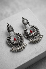 Oxidized Silver-Tone Crescent Jhumka Earrings with Floral Motifs & Beaded Drops, Red/Pink Stone