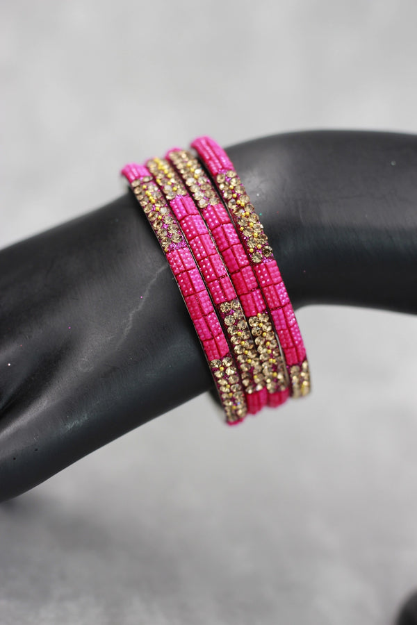 Multicolour crystal bangles set with vibrant bead detailing and gold-tone sparkle, perfect for festive wear, weddings, and mix-and-match eth