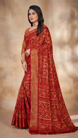 Deep Red Bandhani Chiffon Saree with Gold Zari Motifs and Broad Border for Festive Wear - Deep Red