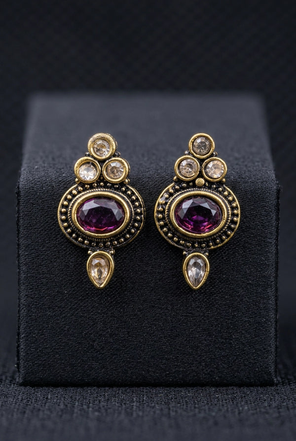 Purple Oval Stone Antique Finish Stud Earrings with Gold-Tone Detailing for Traditional & Festive Wear - Purple
