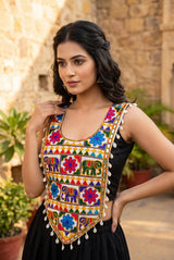 Kutchi Mirror-Work Navratri Blouse with Elephant Motif and Cowrie Border, Sleeveless Ethnic Wear for Women