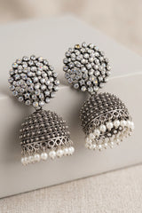 Oxidized Silver Tone Jhumka Earrings with White Stone Stud Top and Pearl Drop Dangles - Black silver