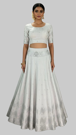 White Jacquard Silk Lehenga with Matching Elbow Sleeve Blouse and Zari Motifs