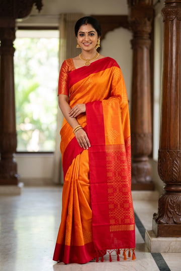 Peach Soft Silk Saree with Kolam Butta Motif and Contrast Red Border