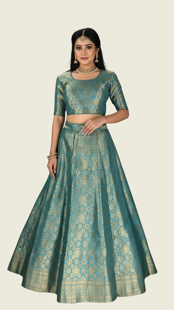 Green Brocade Silk Lehenga with Silver Zari Floral Weave and Matching Designer Blouse - Green