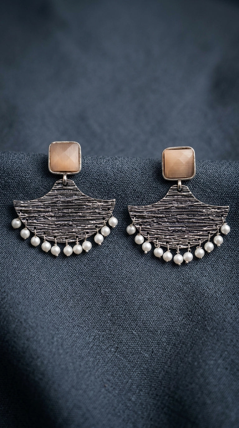 Cream Stone Silver-Tone Textured Teardrop Dangle Earrings with Pearl Drops for Festive Party Wear - Cream