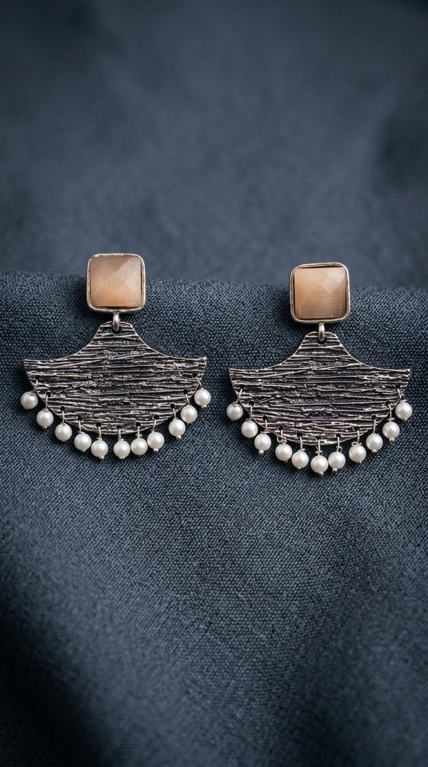 Cream Stone Silver-Tone Textured Teardrop Dangle Earrings with Pearl Drops for Festive Party Wear - Cream