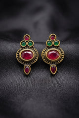 Antique Finish Stud Earrings with Oval Red Stone, Green Accents & Gold-Tone Detailing for Traditional Wear - Red & Green