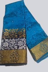 Radiant Charm: Embossed Silk Cotton Saree with Stunning Stone Work