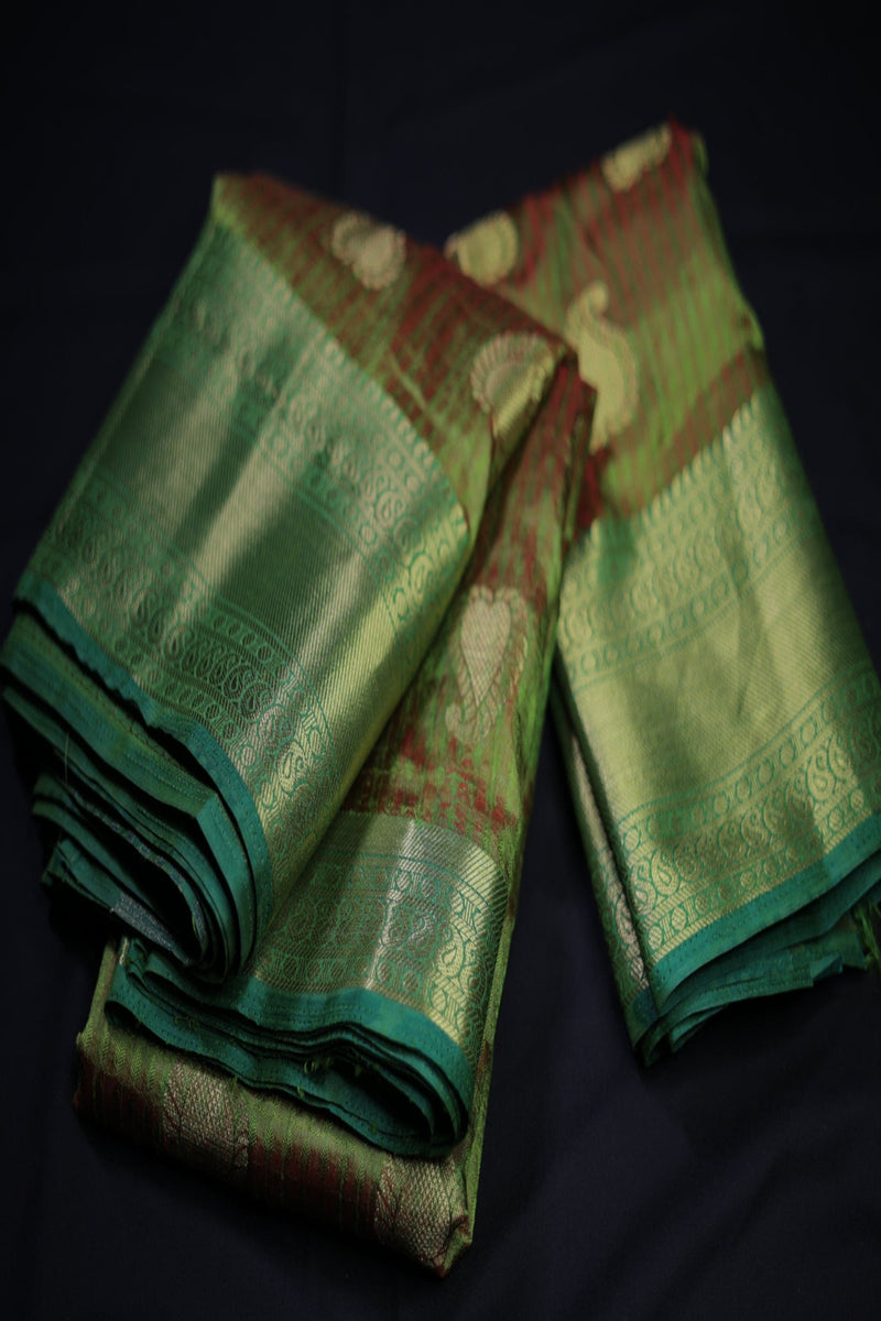 Grand Dual-Shade Semi-Silk Saree with Kanchi Border & Intricate Zari Details