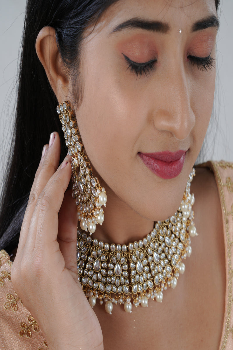 Opulent Kundan Neckset with Pearl Dangles and Tikka by JCS Fashions