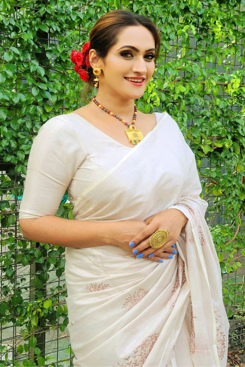 Handwoven Kerala Cotton Saree with Rosegold Zari & Leaf Motif