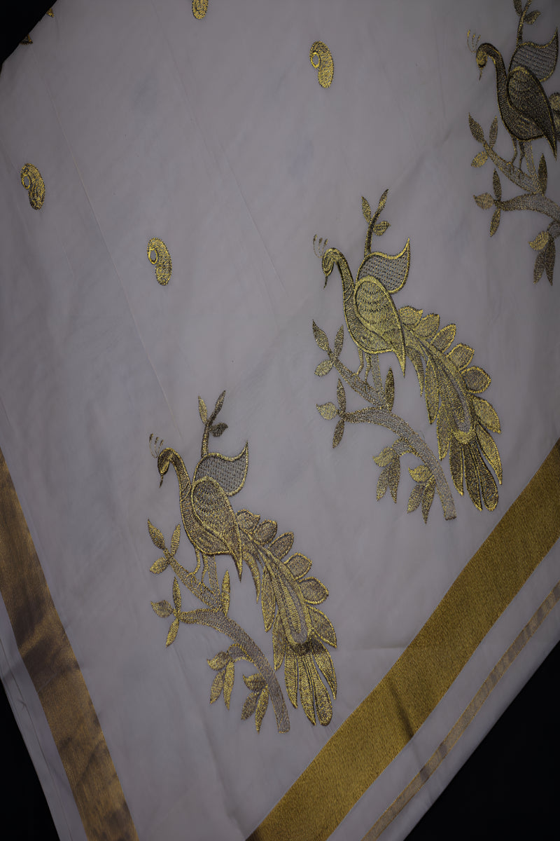 Elegant Kerala Kasavu Cotton Saree with Peacock Motifs and Gold Zari Border