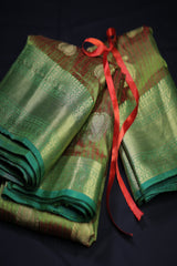 Grand Dual-Shade Semi-Silk Saree with Kanchi Border & Intricate Zari Details