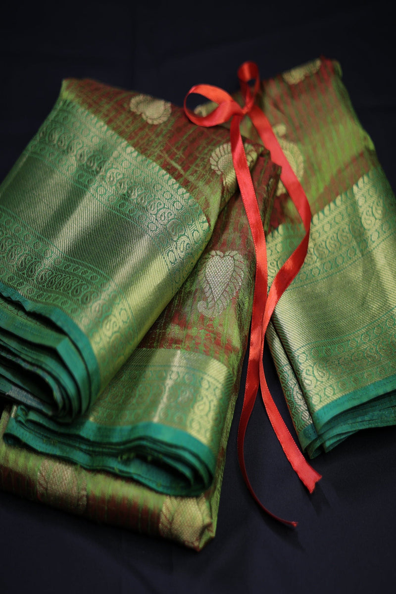 Grand Dual-Shade Semi-Silk Saree with Kanchi Border & Intricate Zari Details