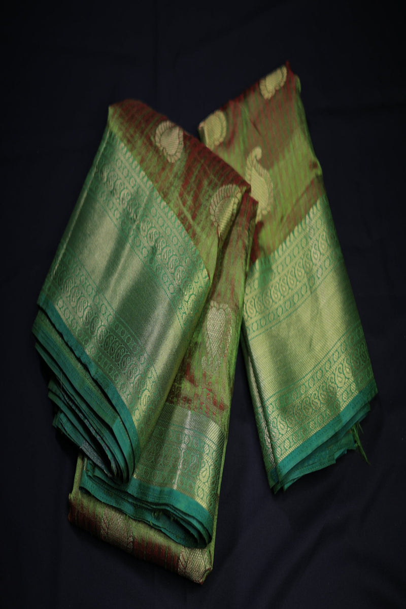 Grand Dual-Shade Semi-Silk Saree with Kanchi Border & Intricate Zari Details