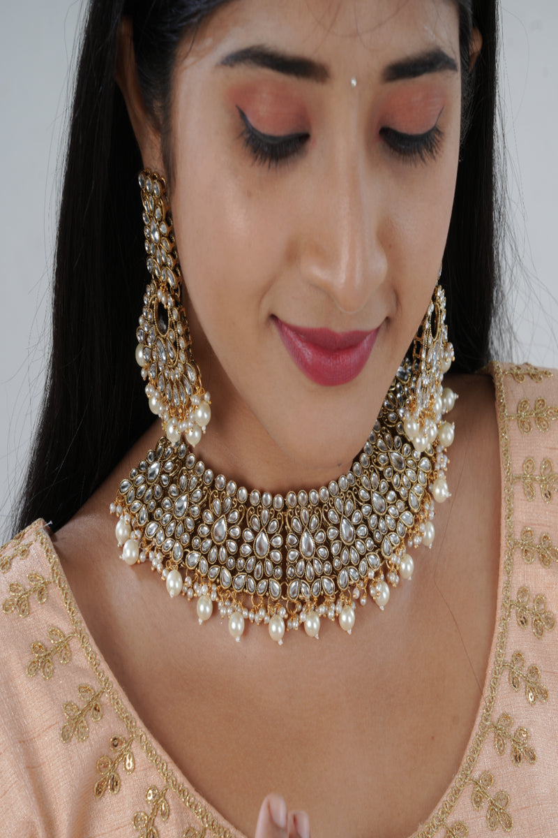 Opulent Kundan Neckset with Pearl Dangles and Tikka by JCS Fashions