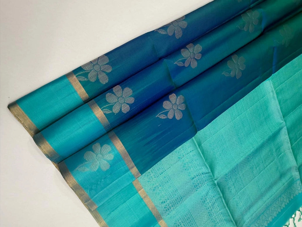 Teal Blue Soft Silk Saree with Contrast Body, Border and Floral Motifs