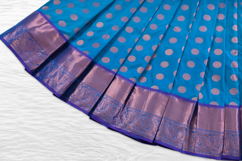 Elegant Peacock Pattern Saree with Copper Zari Detailing by JCS Fashions