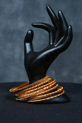Fancy metal bangles with Golden Bead Elegance at JCSFashions Bangles JCS Fashions