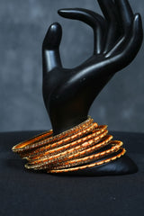 Fancy metal bangles with Golden Bead Elegance at JCSFashions Bangles JCS Fashions Yellow 2.60