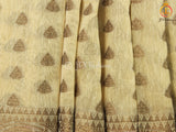 Beige Color Kadhi Linen saree with all-over Antic zari motifs