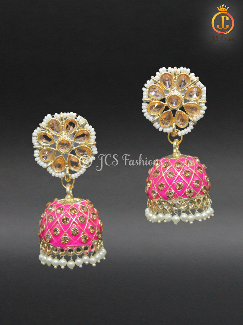 Elegant Kundan Jhumka Earrings With stones and imitation pearls.