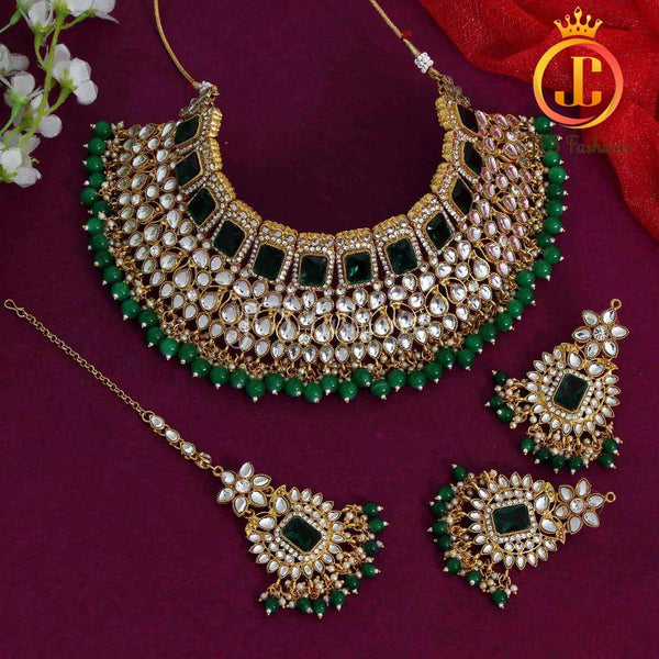 Elegant Green Kundan necklace set with earrings and tikka